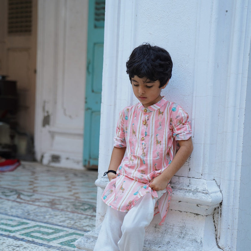 Indian boy wearing the The Showman kurta pajama set in Pure Muslin Silk, Blush Pink — FunnyBones.in Mehfil '26 festive collection.