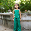 Indian girl wearing the The Storyteller kurti palazzo set in Pure Soft Silk (Extra Soft), Emerald Teal — FunnyBones.in Mehfil '26 festive collection.