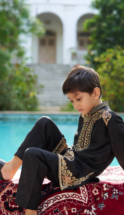 Indian boy wearing the Shahenshah kurta pajama set in Pure Soft Silk, Jet Black — FunnyBones.in Mehfil '26 festive collection.