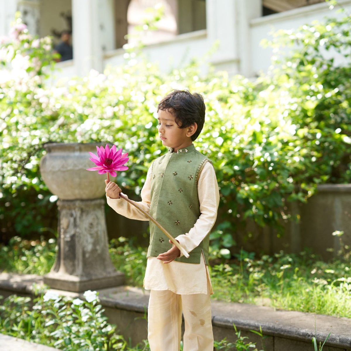 Indian boy wearing the Wild Kingdom koti kurta pajama set in Pure Silk (Extra Soft), Olive Green — FunnyBones.in Mehfil '26 festive collection.