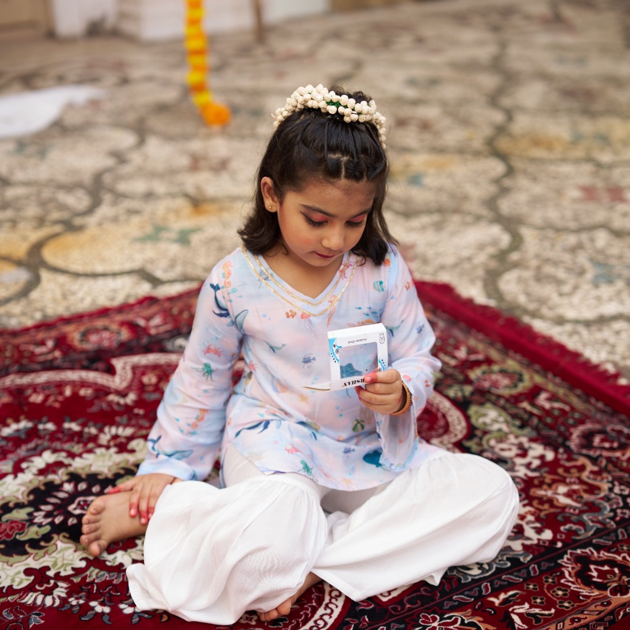 Indian girl wearing the Ocean Whisper kurti sharara set in Pure Muslin Silk, Ice Blue Marine Print — FunnyBones.in Mehfil '26 festive collection.