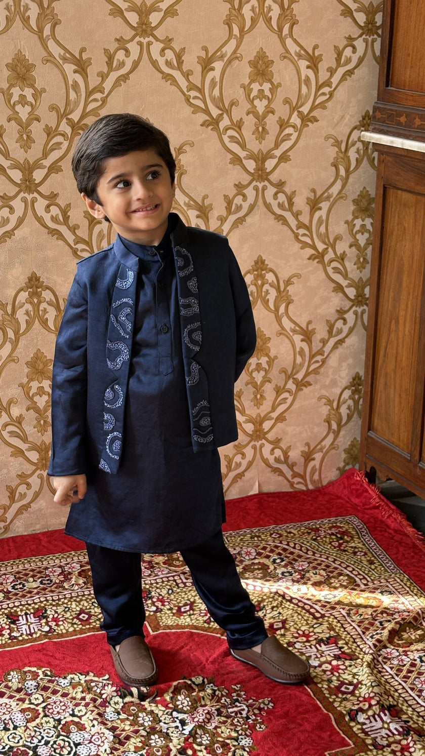Boy wearing FunnyBones Atrang Amoort Koti Kurta Pajama Set – navy koti kurta pajama set with white embroidered panels