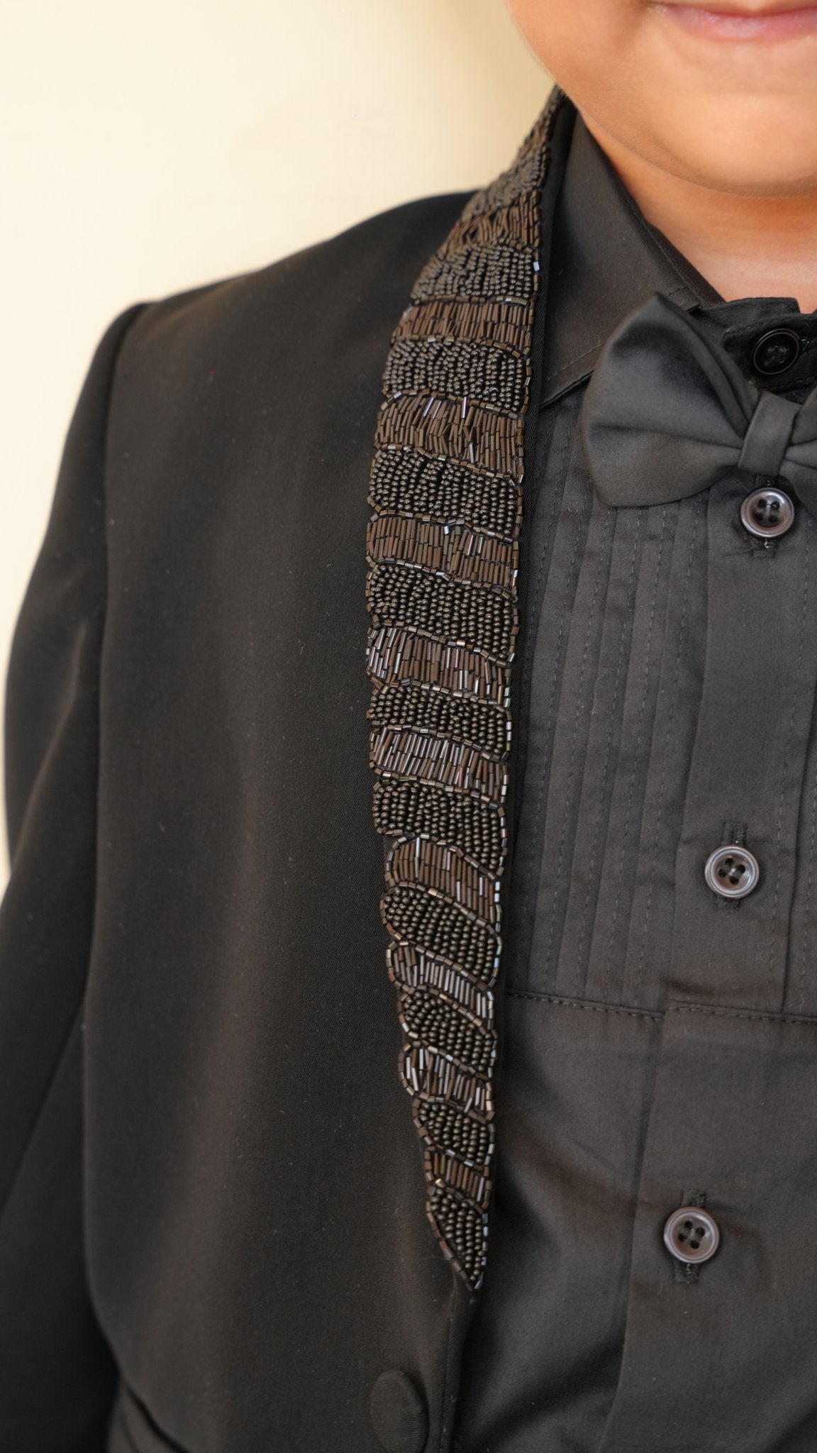 FunnyBones Black Blazer with Sequin Shawl Lapel – close-up of hand-sequinned shawl lapel