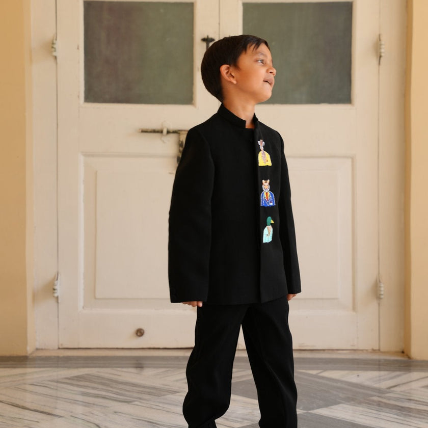 Boy wearing FunnyBones Black Jodhpuri with Animal Portraits – black jodhpuri with embroidered animal portrait patches