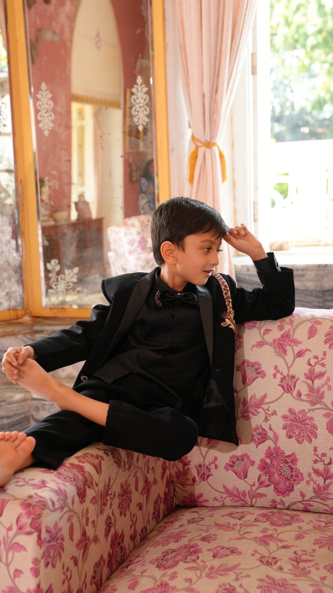 FunnyBones Black Tuxedo with Beaded Giraffe – relaxed seated look, kids wedding wear