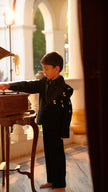 FunnyBones Black Tuxedo with Butterfly Bee – boy by a vintage gramophone