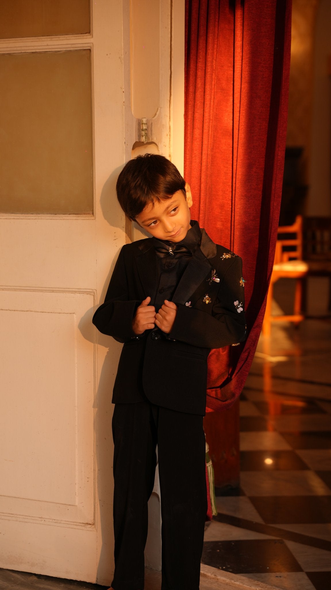 FunnyBones Black Tuxedo with Butterfly Bee – classic tuxedo pose