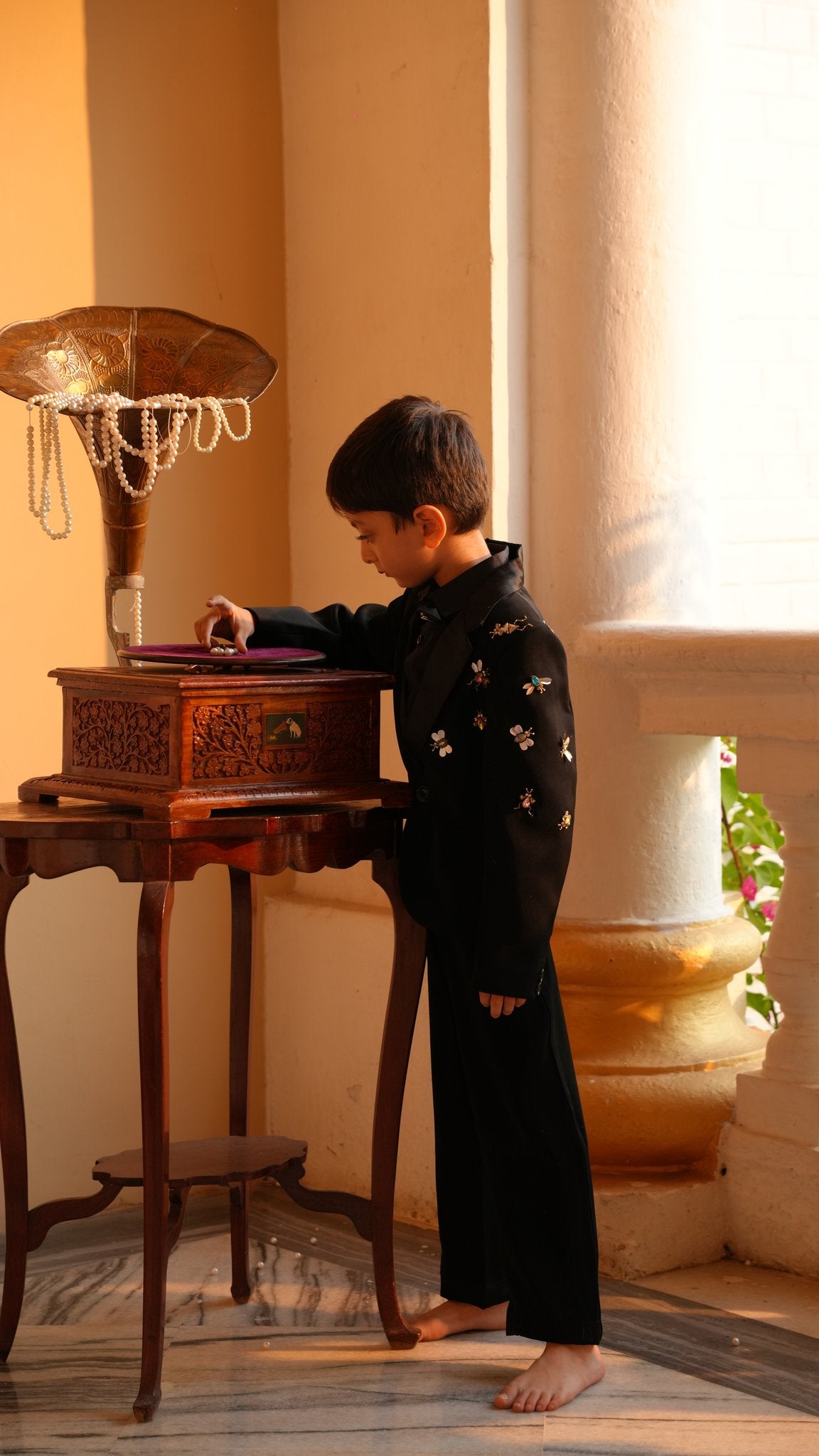FunnyBones Black Tuxedo with Butterfly Bee – boy at a vintage gramophone