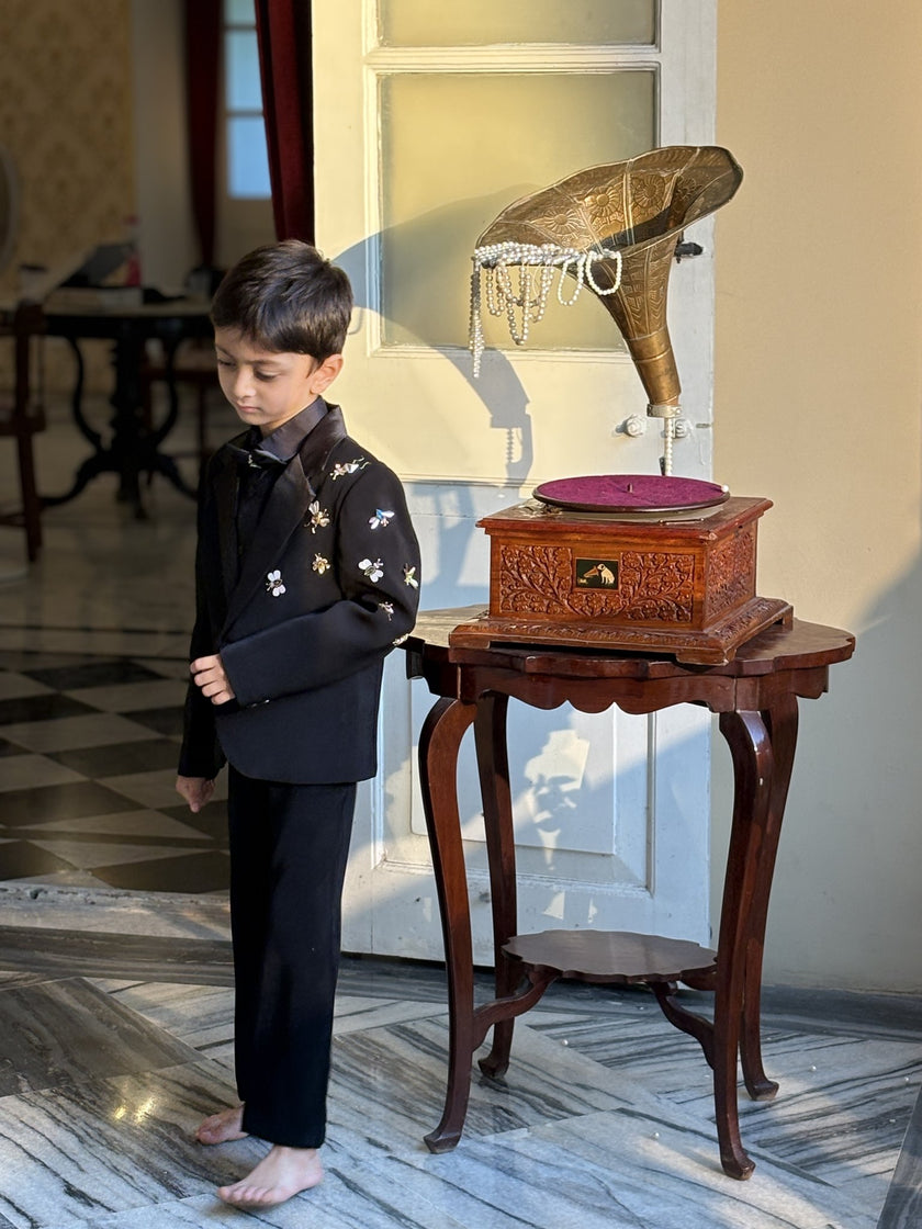 FunnyBones Black Tuxedo with Butterfly Bee – standing by the gramophone