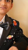 FunnyBones Black Tuxedo with Galaxy Embroidery – close-up of planet and rocket embroidery