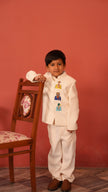 Boy wearing FunnyBones Ivory Jodhpuri with Animal Portraits – ivory jodhpuri with embroidered animal portrait patches