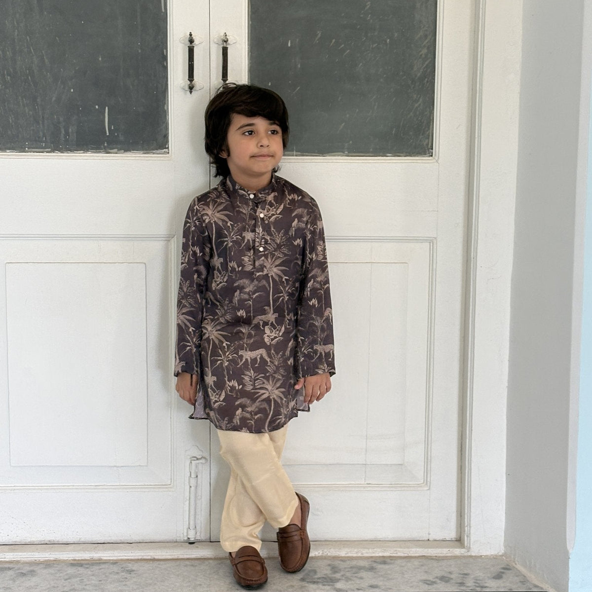 Boy wearing FunnyBones Midnight Palm & Leopard Nehru Jacket – midnight palm and leopard print koti set