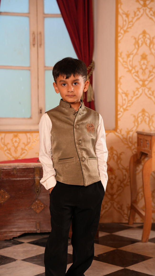 Boy wearing FunnyBones Ivory Nehru Jacket with Crab Motif – sage koti with embroidered crab, white shirt and black trousers