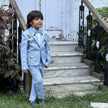 Boy wearing FunnyBones Powder Blue Blazer with Cartoon Patches – powder blue blazer suit with cartoon patches