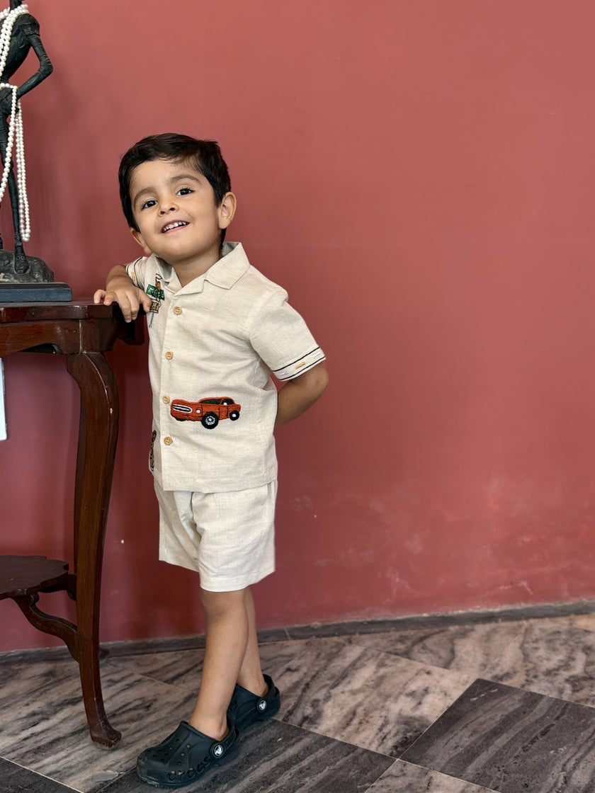 Boy wearing FunnyBones Road-Trip Resort Shirt – cotton linen camp-collar shirt and shorts with road-trip embroidery