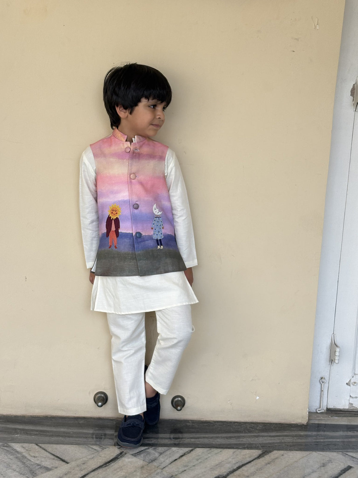 Boy wearing FunnyBones Sunset Storybook Nehru Jacket Set – ombre sunset print Nehru jacket with ivory kurta
